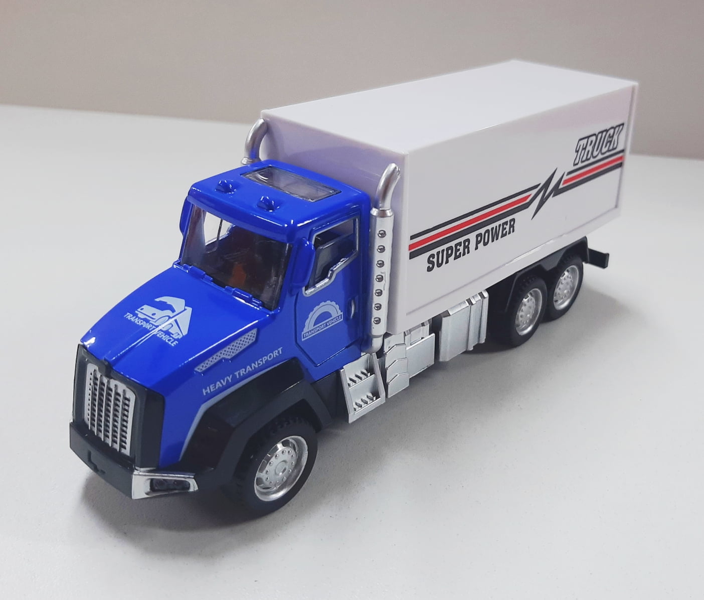 Miniatura Brinquedo Som e Luzes Caminhão plataforma carro azul 17cm