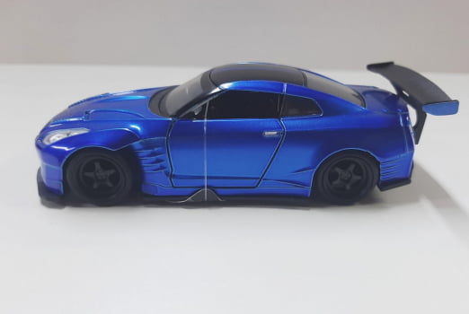 Miniatura 2009 Nissan Brian GT-R (R35) Velozes e Furiosos Escala 1/32