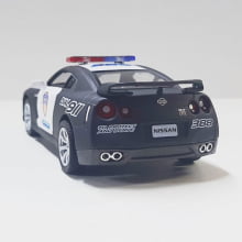 Miniatura Carrinho de Ferro Nissan 2009 GT-R R35 Policial Escala 1/36