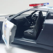 Miniatura Carrinho de Ferro Nissan 2009 GT-R R35 Policial Escala 1/36