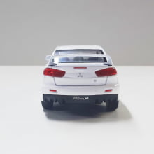 Miniatura de Ferro 2008 Mitsubishi Lancer Evo X Branco Escala 1/36