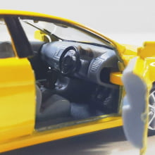 Miniatura de Ferro 2008 Mitsubishi Lancer Evo X Amarelo Escala 1/36